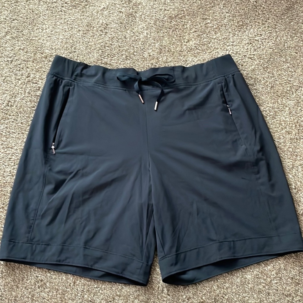 Calia, size large, black shorts w/ rose gold accents, mid rise short.